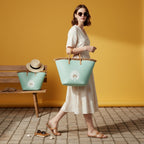 Day Off Tote in Lagoon Mint, carried and on a bench