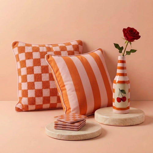 Cherry on Top vase in Sunset Coral with cushion covers and coasters