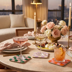Me Time coasters, all three colours, at a candlelit dinner